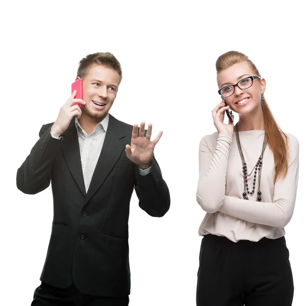 Happy smiling business people calling by mobile telephone — Stock Photo, Image