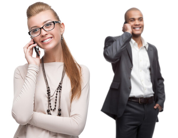 happy smiling business people calling by mobile telephone