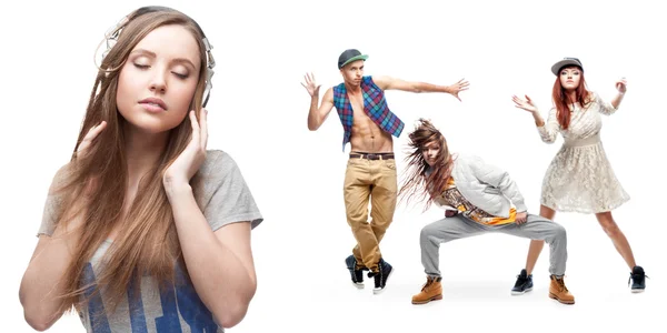 Young woman listening music and group of dancers on background — Stock Photo, Image