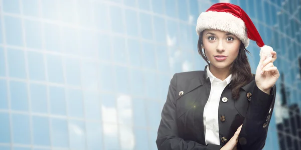 Geschäftsfrau mit Weihnachtsmann-Hut — Stockfoto