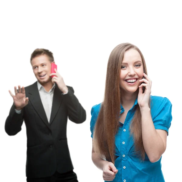 Happy smiling business people calling by mobile telephone — Stock Photo, Image