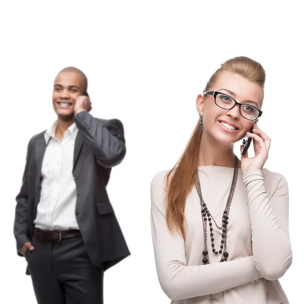 Feliz sonriente gente de negocios llamando por teléfono móvil —  Fotos de Stock