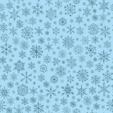 Mavi arkaplanda kar taneleri