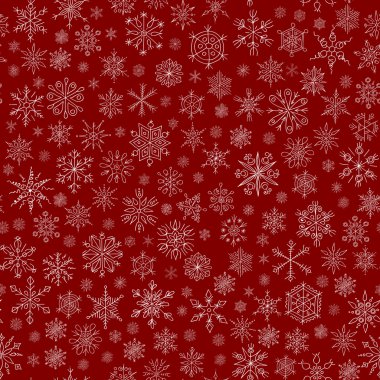 kırmızı bir arka plan üzerinde kar taneleri