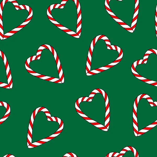 Motif sans couture vectoriel avec bonbons de Noël sur backgrou vert — Image vectorielle