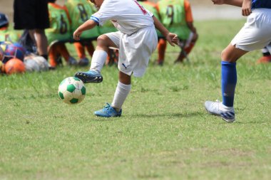 Japon ilkokul futbol takımının maç sahnesi.