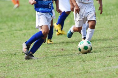 Japon ilkokul futbol takımının maç sahnesi.