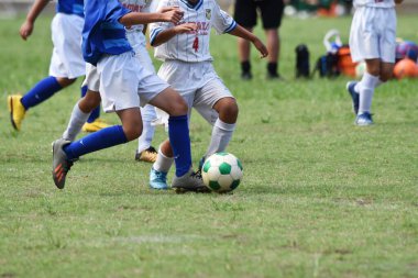 Japon ilkokul futbol takımının maç sahnesi.