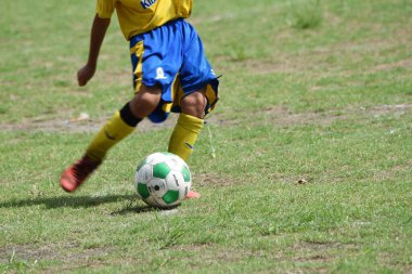 Japon ilkokul futbol takımının maç sahnesi.