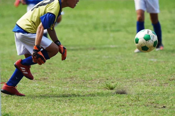 Japon ilkokul futbol takımının maç sahnesi.