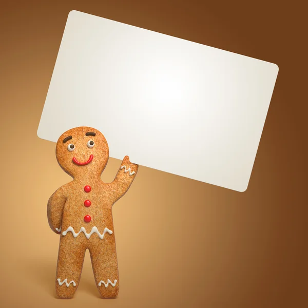 Gingerbread man holding white card — Stock Photo, Image