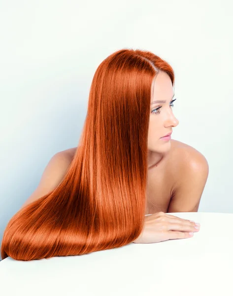 Fashion model with long red hair — Stock Photo, Image