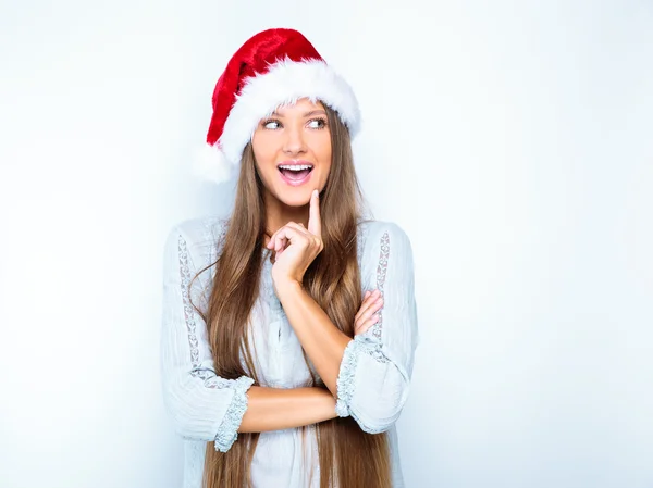 Menina feliz no Natal santa chapéu — Fotografia de Stock