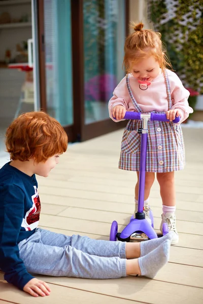 Cheerful Siblings Having Fun Playing Patio Home — Stock Photo, Image