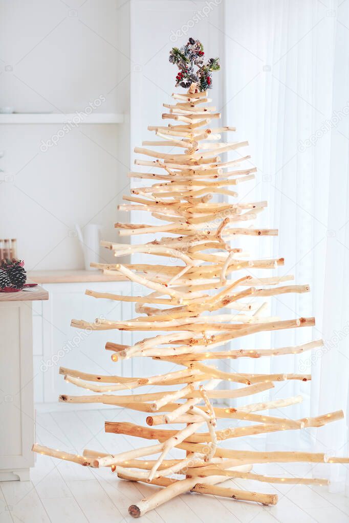 eco friendly, reusable christmas tree made from wood residues, that was left after sanitary cleaning of forest belt