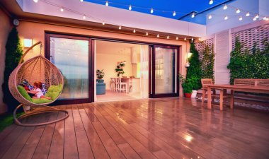 cozy rooftop patio with sliding doors at the evening after the rain clipart