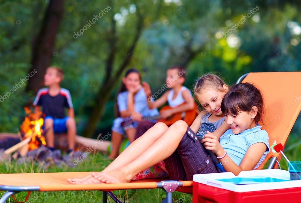 Kids having fun in summer camp — Stock Photo © olesiabilkei 51931453