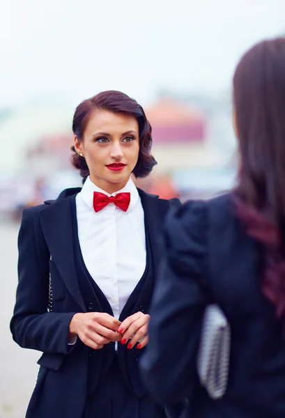 Beautiful woman in black suit — Stock Photo, Image