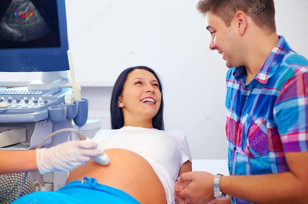 happy couple on ultrasound, determines the gender of child