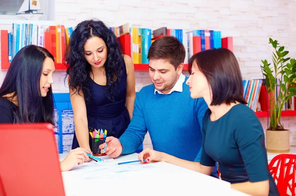 Young and creative team discussing business project — Stock Photo, Image
