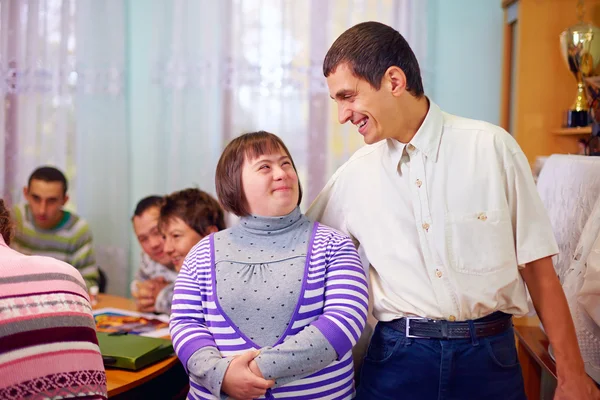 Happy people with disability in rehabilitation center Stock Image