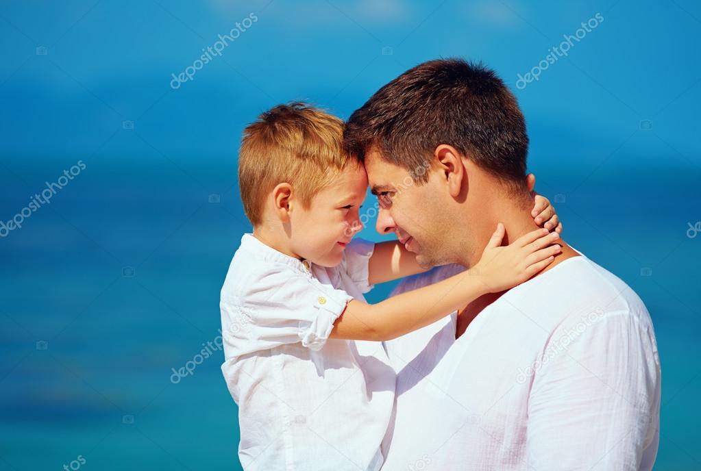 cute father and son embracing, family relationship