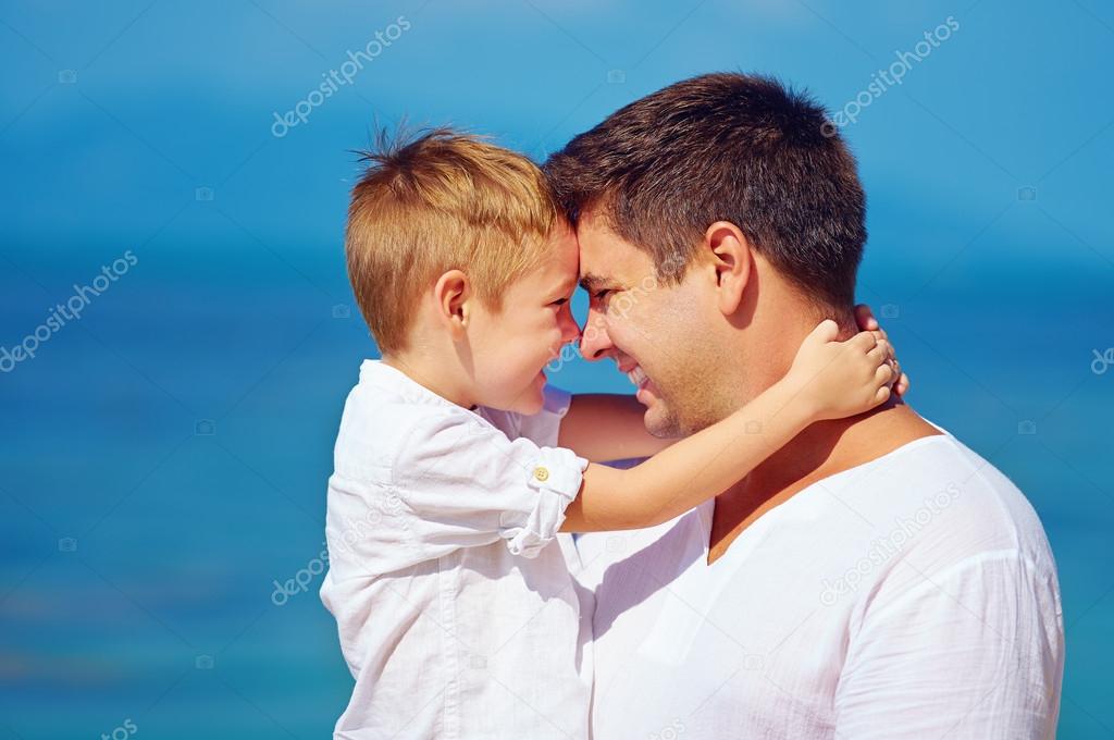 cute father and son embracing, family relationship