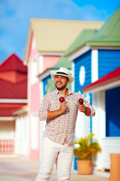 Happy street musician dancing on caribbean street — Stock Photo, Image