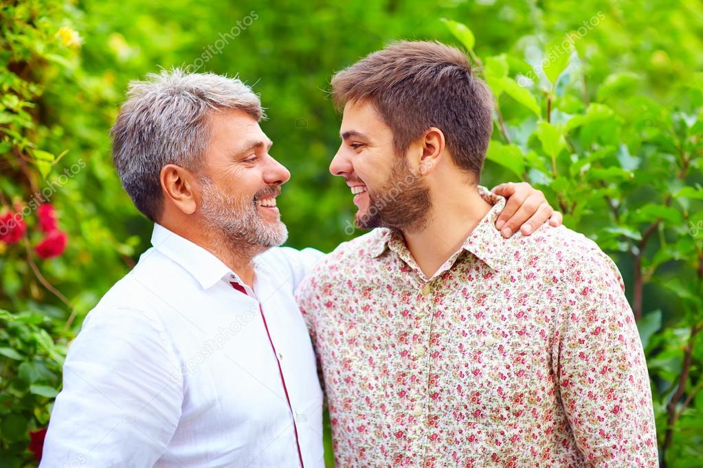 portrait of happy father and son, that are similar in appearance