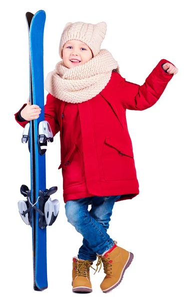 Счастливый взволнованный мальчик с лыжным снаряжением — стоковое фото