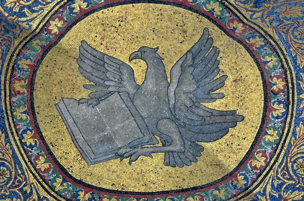 Golden mosaic of eagle and book — Stock Photo, Image
