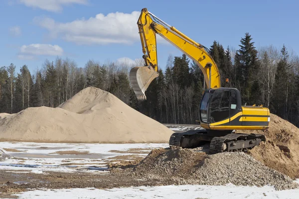 Tracked excavator on a construction site — Stock Photo, Image