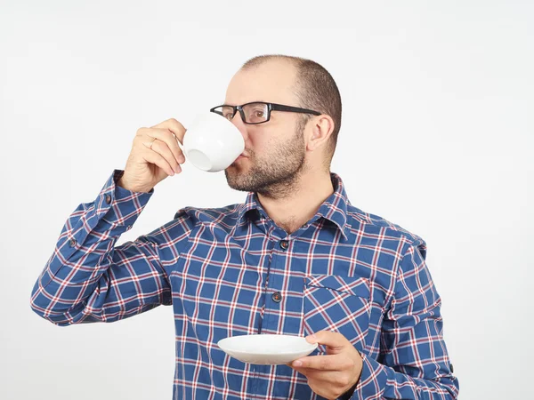 Un caucazian bea cafea Fotografie de stoc