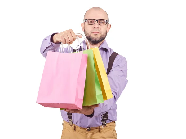 Homem com sacos de papel de compras coloridos — Fotografia de Stock