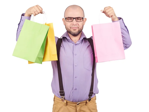 Homem com sacos de papel de compras coloridos — Fotografia de Stock