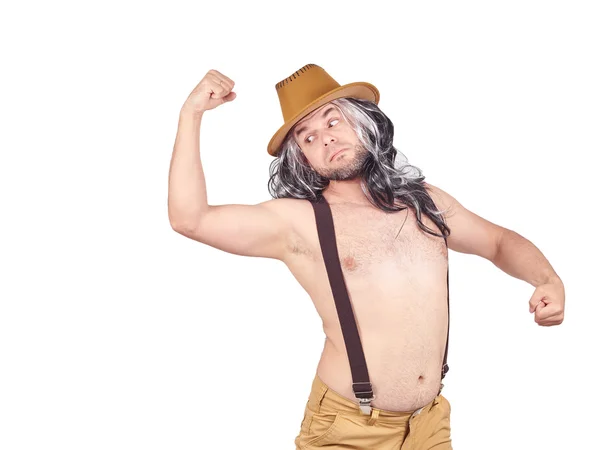 Ο άνθρωπος με το καπέλο να δείχνει τους μυς. — Φωτογραφία Αρχείου
