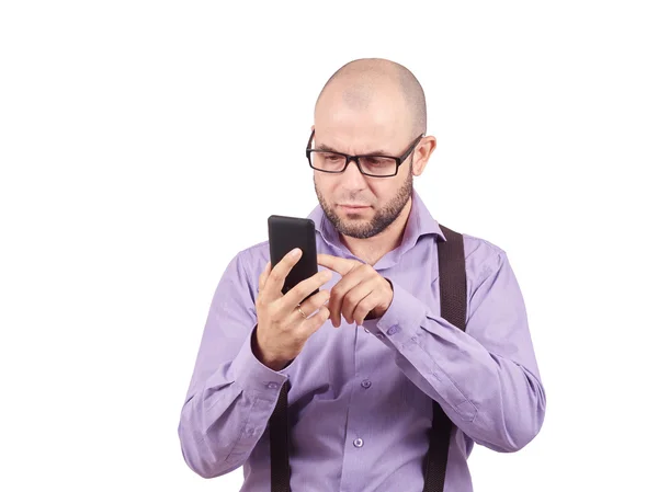 Careca homem assustado olha para o telefone . — Fotografia de Stock