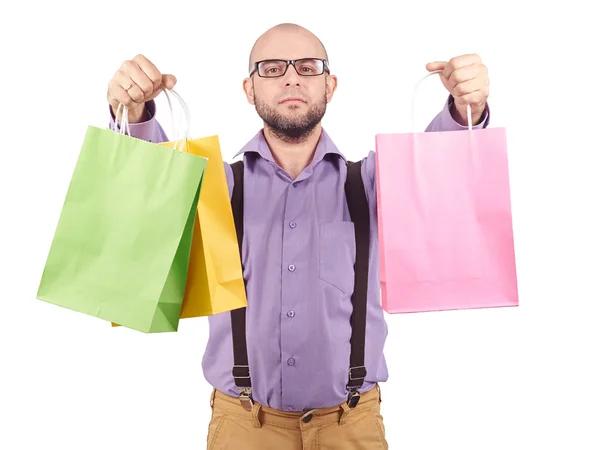 Homem com sacos de papel de compras coloridos — Fotografia de Stock