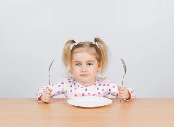 Vork en lepel met meisje — Stockfoto