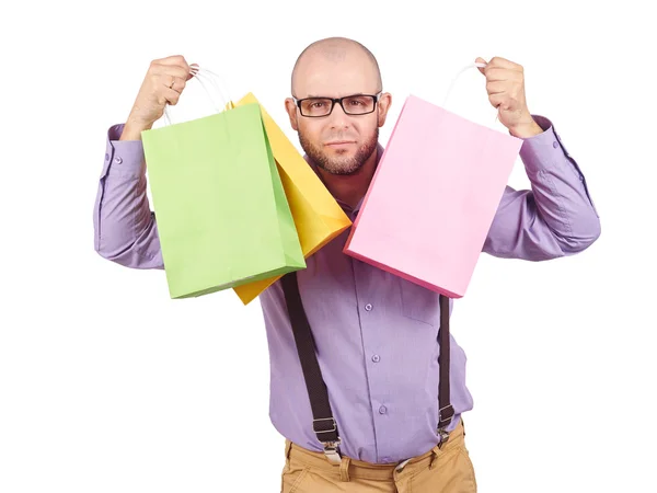 Człowiek z kolorowe zakupy torby papierowe — Zdjęcie stockowe