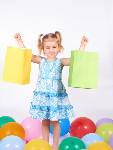 Shopping child. little girl holding shopping bags — Stock Photo, Image