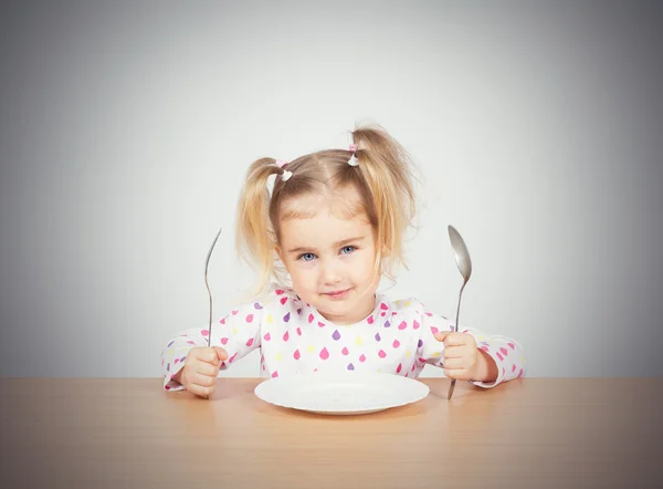 Vork en lepel met meisje — Stockfoto