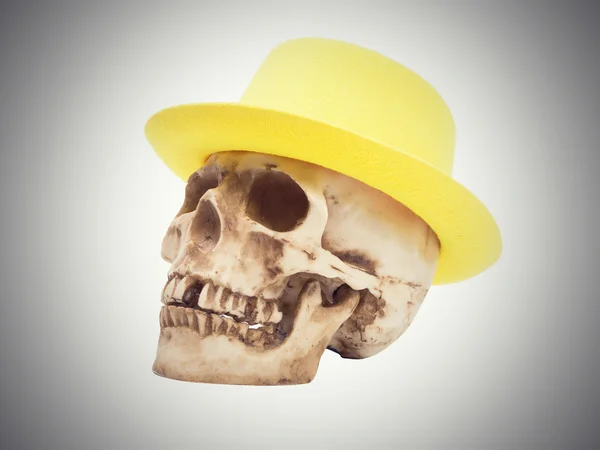 Calavera en el sombrero amarillo —  Fotos de Stock