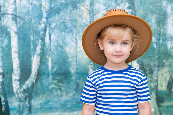 Menina brincando em cowboy — Fotografia de Stock