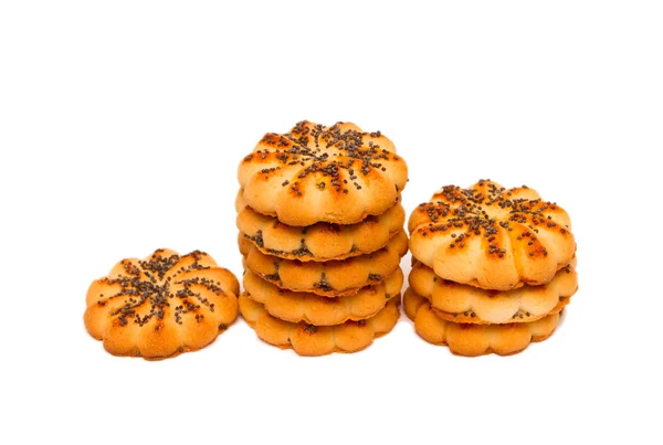Ronde suiker koekjes met maanzaad op een witte achtergrond. — Stockfoto
