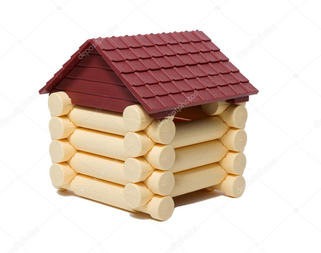 Model wooden houses made of logs are isolated.