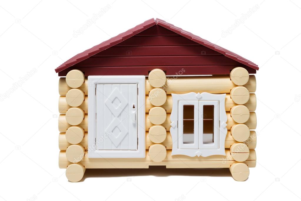 Model wooden houses made of logs are isolated.