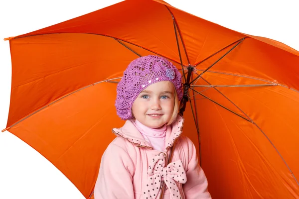 Menina bonito pouco com um guarda-chuva isolado no fundo branco — Fotografia de Stock