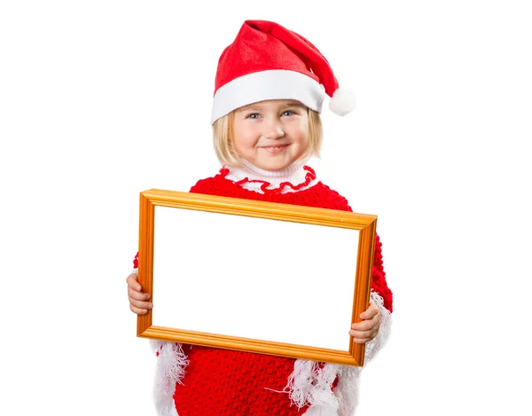 Niña con sombrero Santa Claus sosteniendo el marco con un fondo blanco —  Fotos de Stock