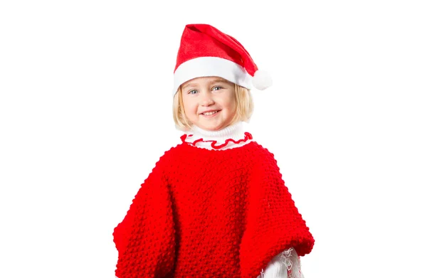 Niña en un sombrero Santa Claus sobre fondo blanco . — Foto de Stock